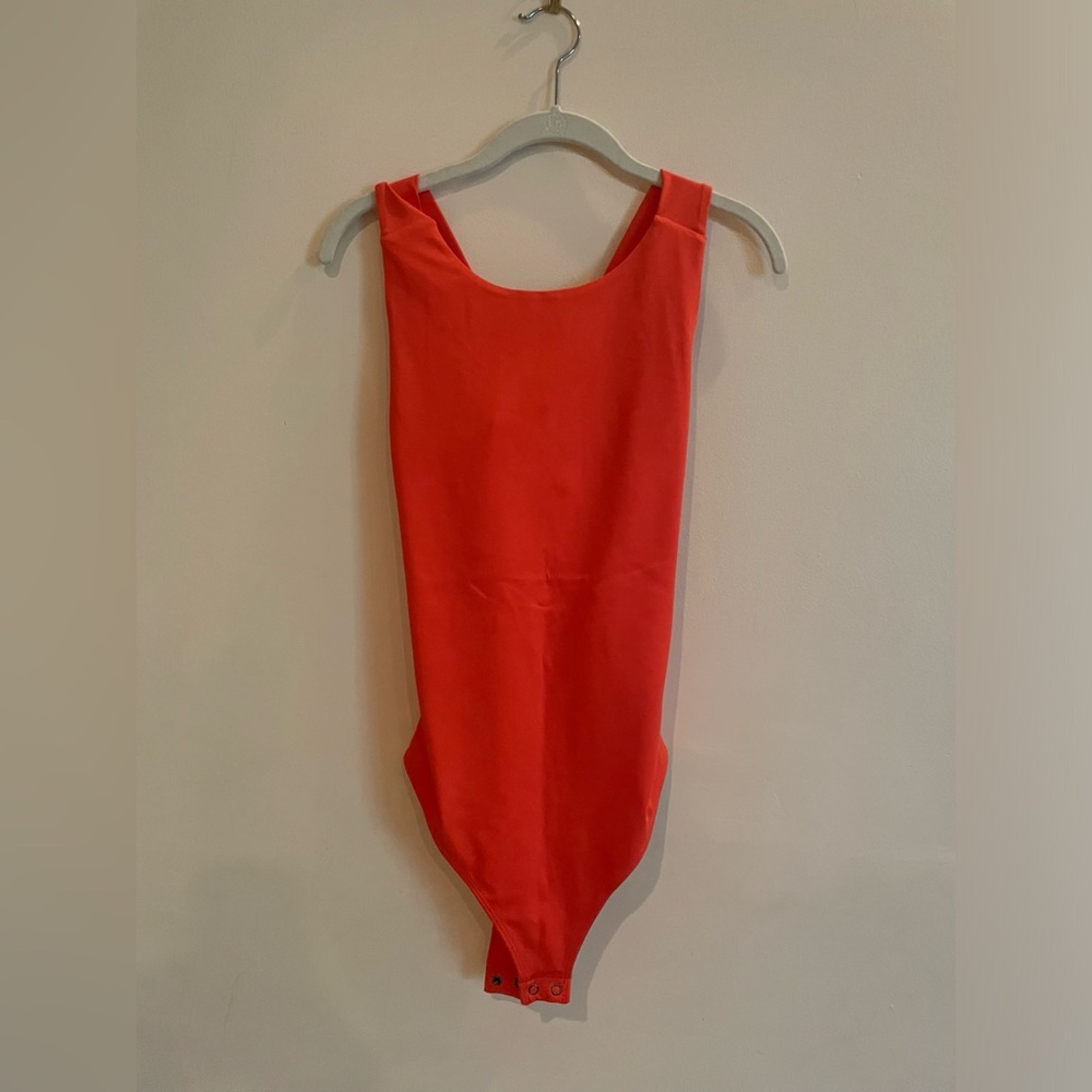 Brand new express criss cross back bodysuit
